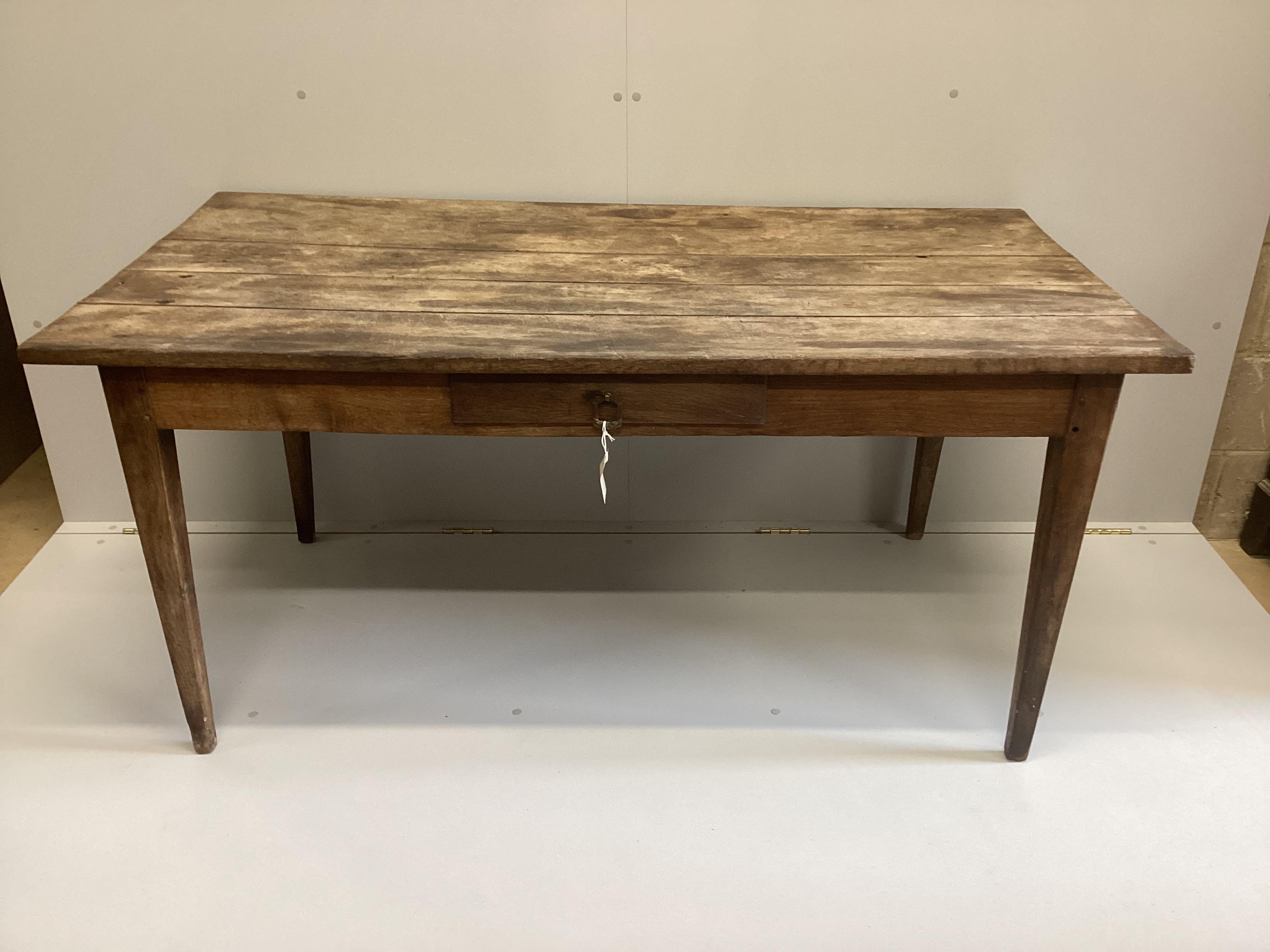 A 19th century French rectangular oak kitchen table, width 149cm, depth 78cm, height 69cm
